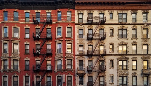 Two side-by-side NYC apartment buildings