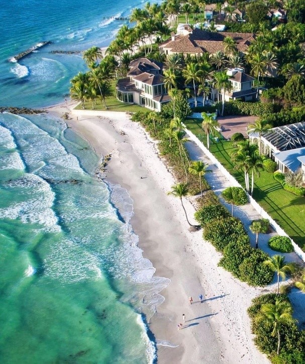 Aerial shot of beach and houses in Naples, Florida