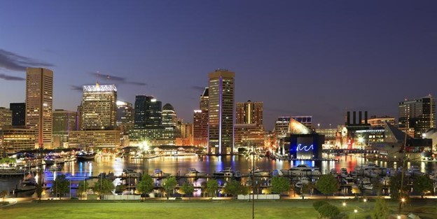 a view of the Baltimore skyline at dusk