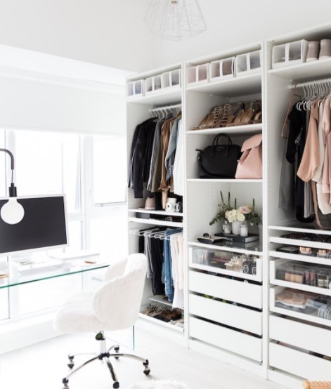 Walk-in closet with office space.