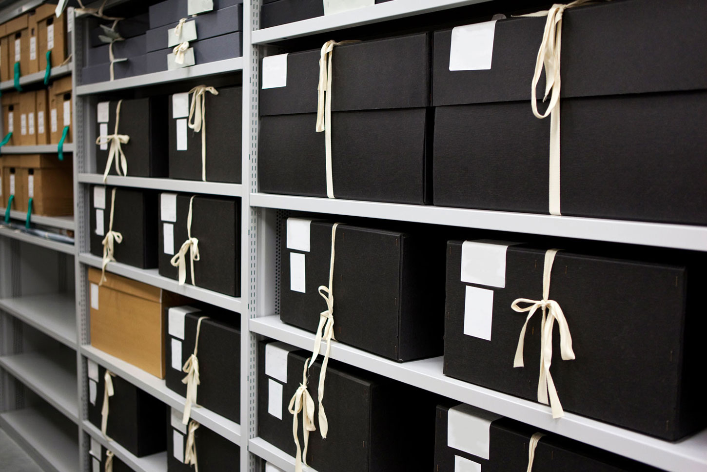 Close up of archival boxes on storage racks