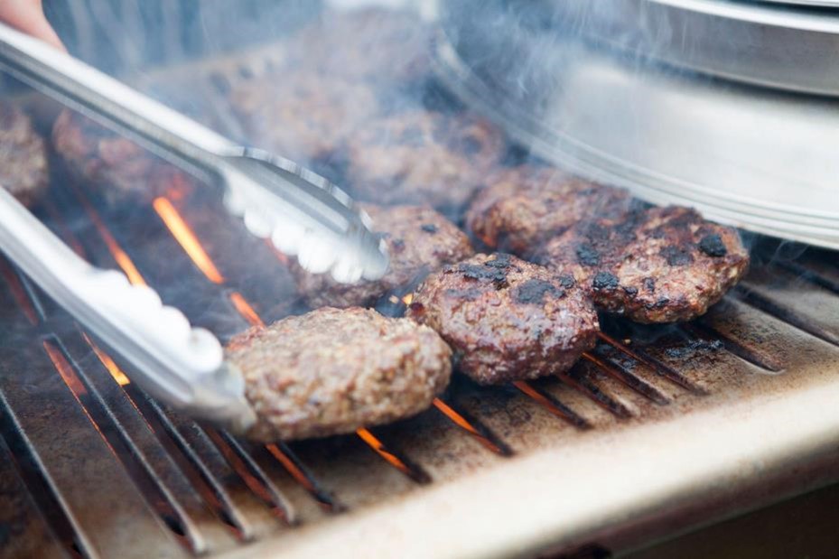 Grilling hamburgers on a grill