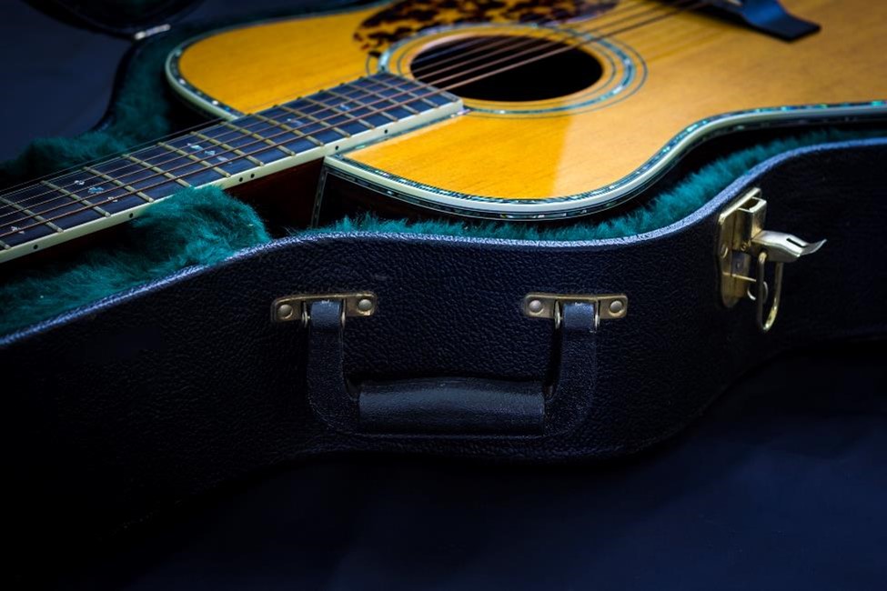 A guitar stored in a case