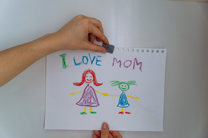 children's drawing on refrigerator that says I love mom