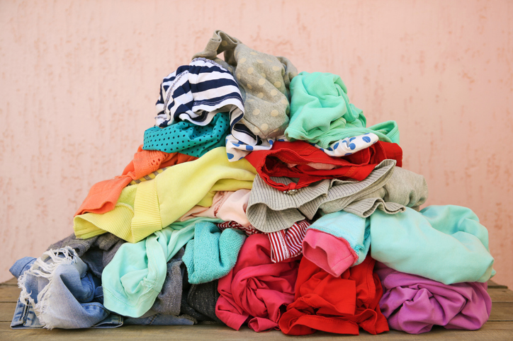 pile of clothing, several colors, sizes, and shapes