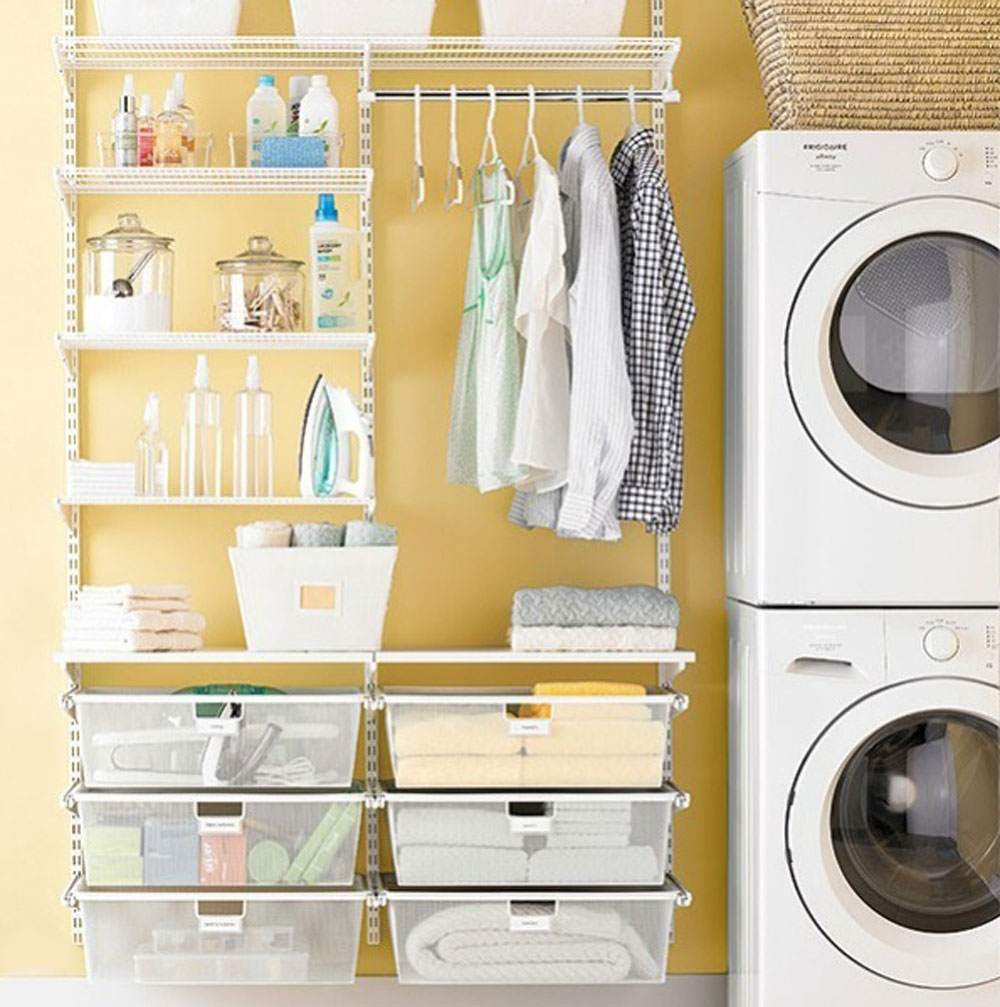A shelving rack next to a washer and dryer with labeled storage bins